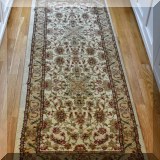 DR04. Oriental runner rug. Measures approx. 6' x 2'4” 